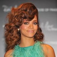 Rihanna promotes her new fragrance photos